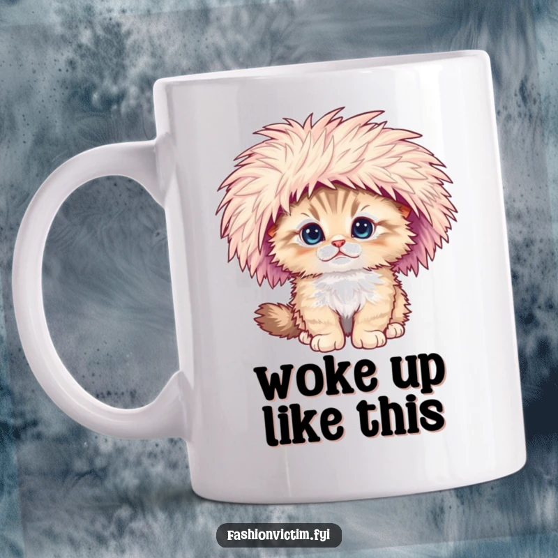 Funny mug featuring a fluffy kitten comically falling over while wearing a ridiculously large feathered hat.