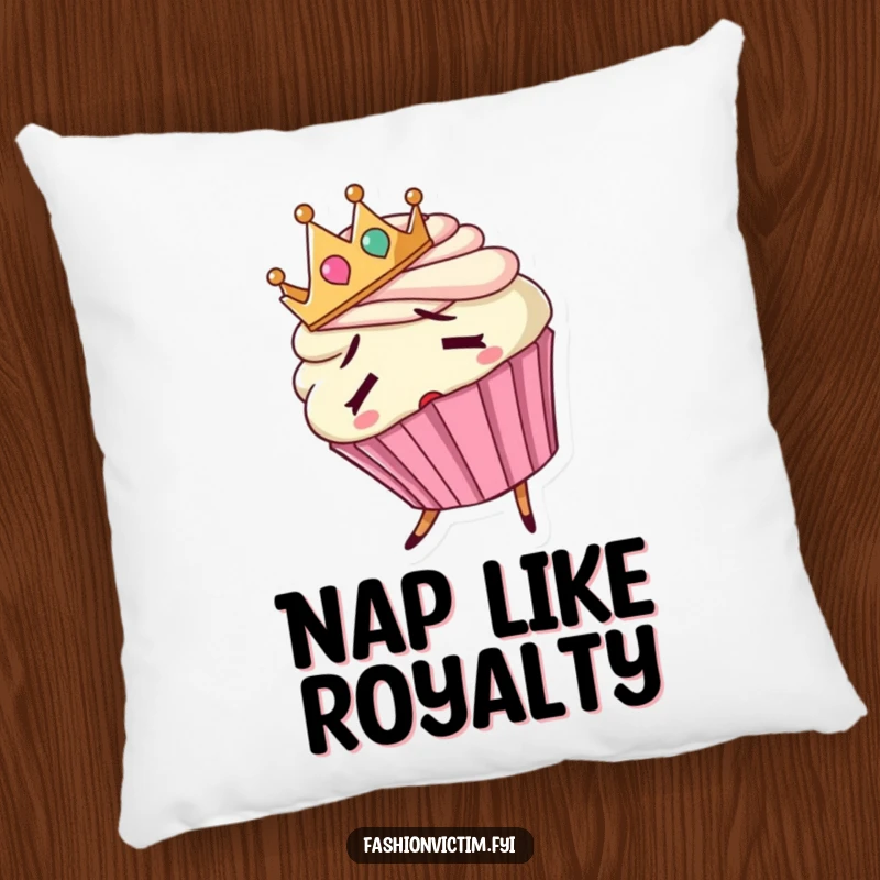 Funny pillow featuring a confused cupcake wearing a backward tiny crown and tripping, looking sweetly lost.